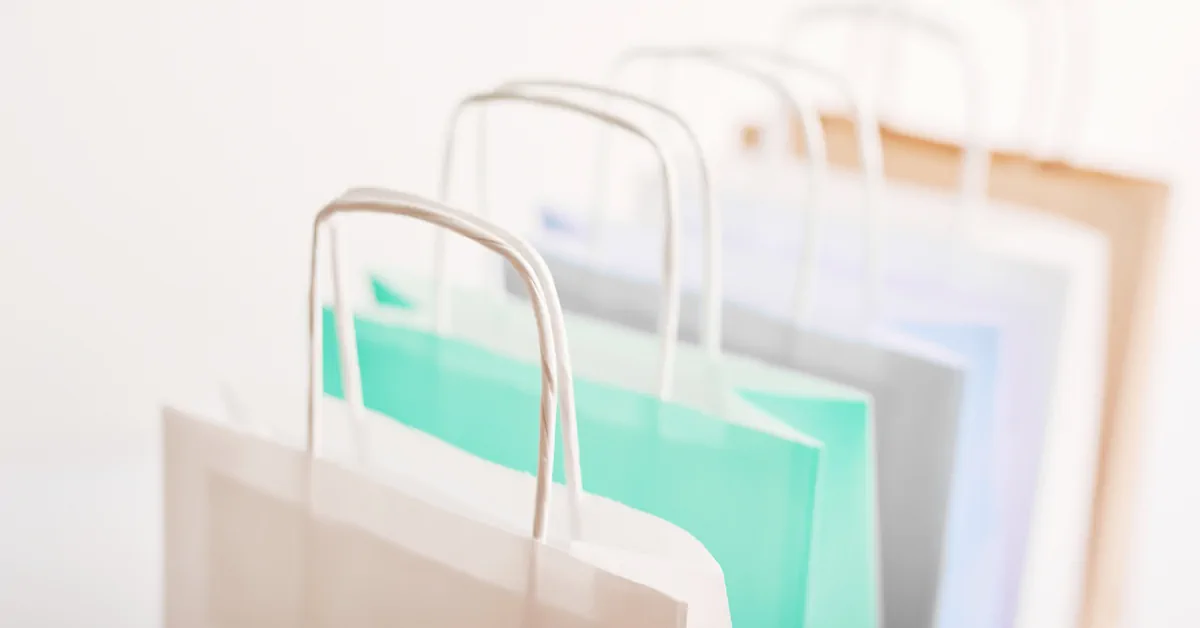 Shop your stash 1200×628 px Empty shopping bags representing shopping what you already have.