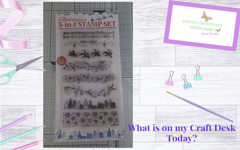 Living Creatively with Fibro | Christmas 5 in 1 stamp set on craft desk