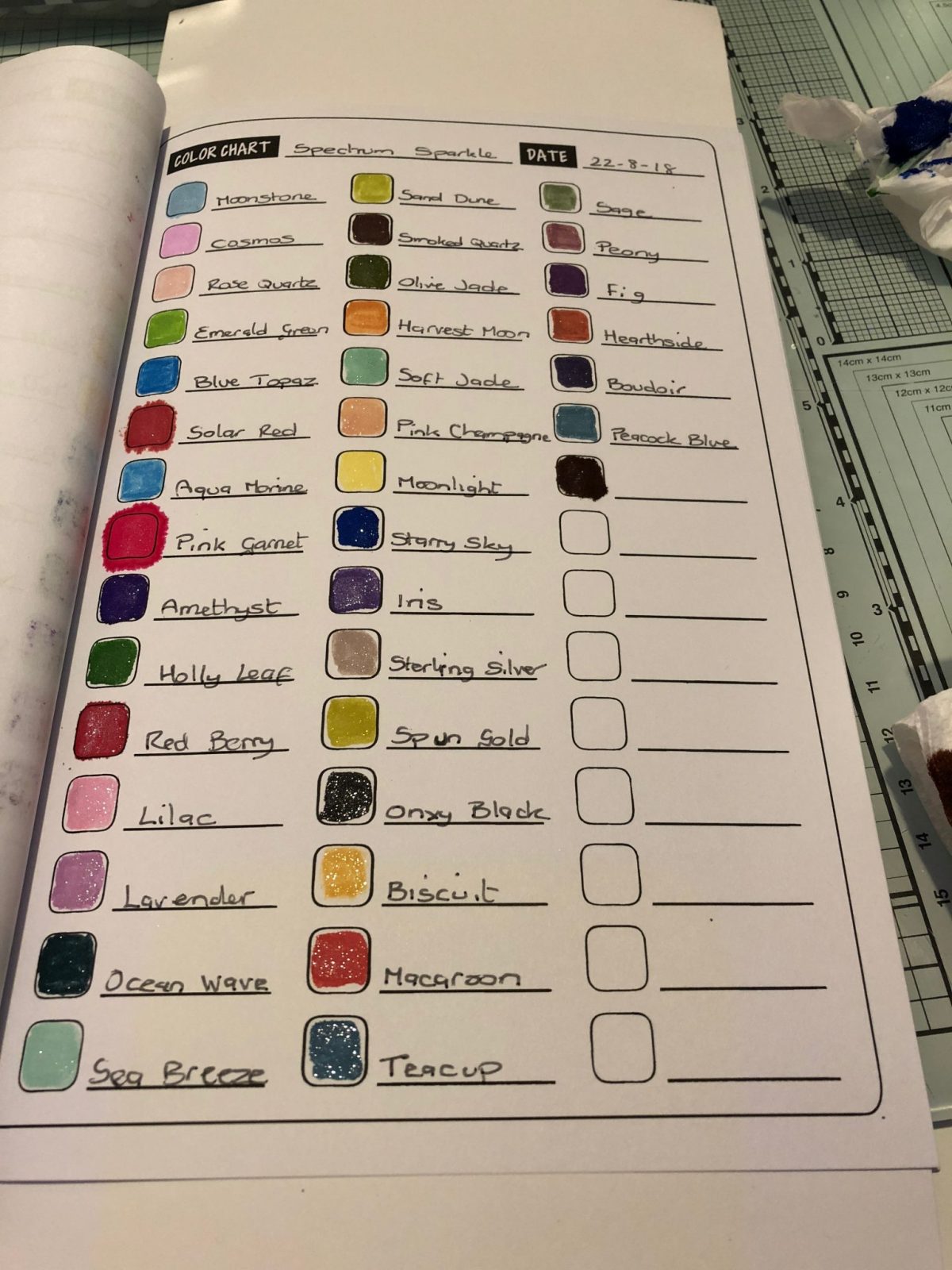 My Spectrum Noir Sparkle Pen swatches Living Creatively with Fibro | My Spectrum Noir Sparkle Pen swatches showing how some of them have spread out of the boxes
