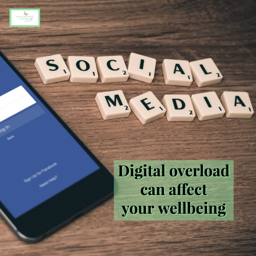An image of the corner of a phone and letters spelling Social Media. The words Digital Overload can affect your wellbeing.