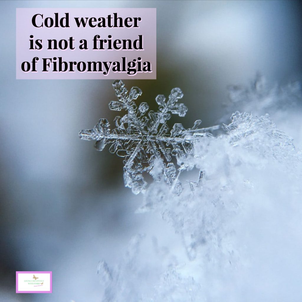 An image of a snowflake and the words Cold Weather is not a friends of Fibromyalgia