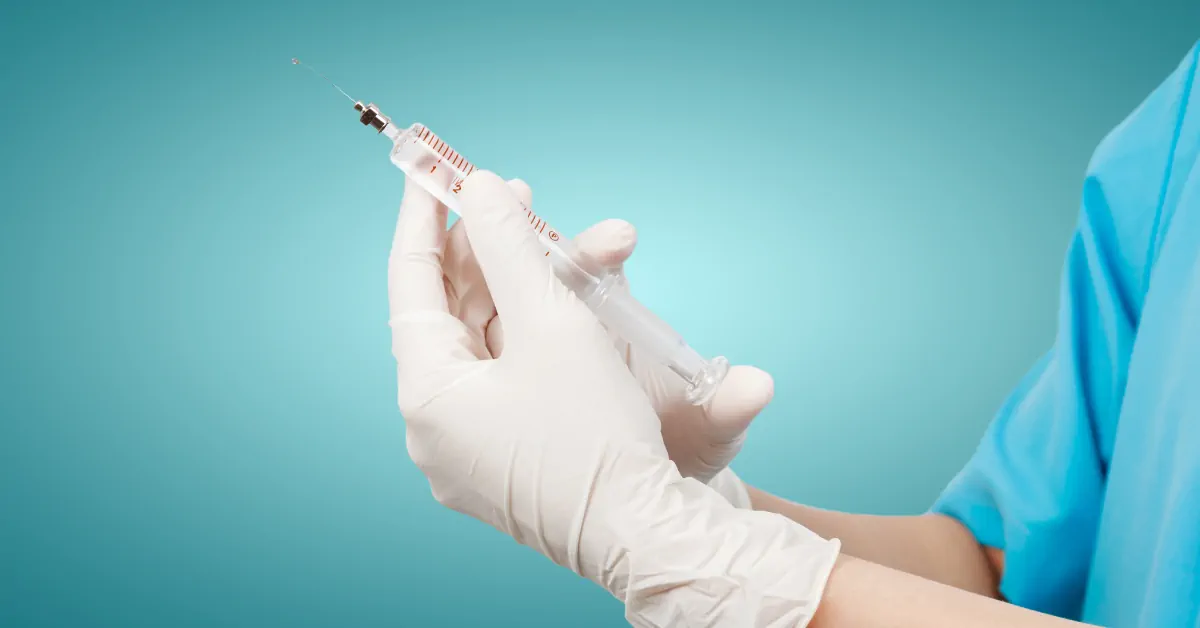 A nurse with a syringe